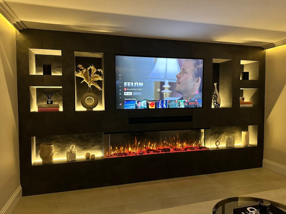 Backlit media wall with integrated feature lighting