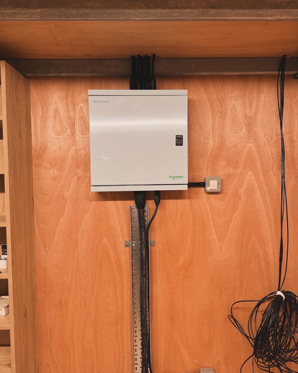 Schneider Electric distribution board installed on a timber wall